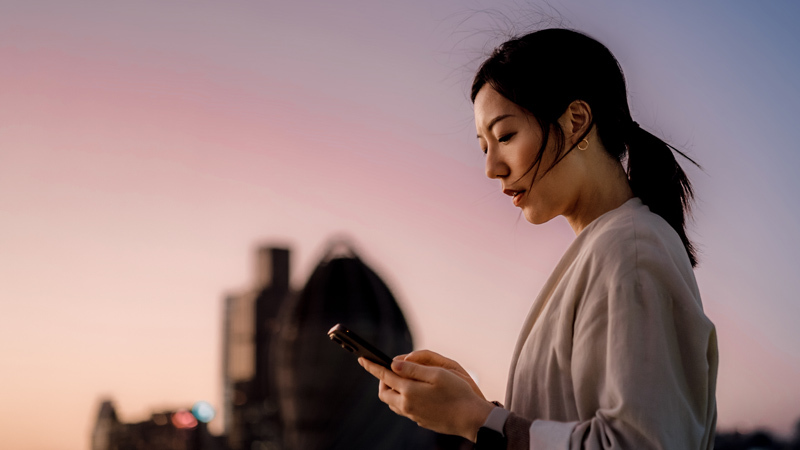 Woman frowning at mobile